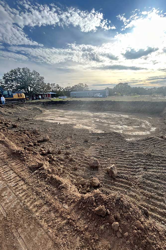 build a pond in quinlan
